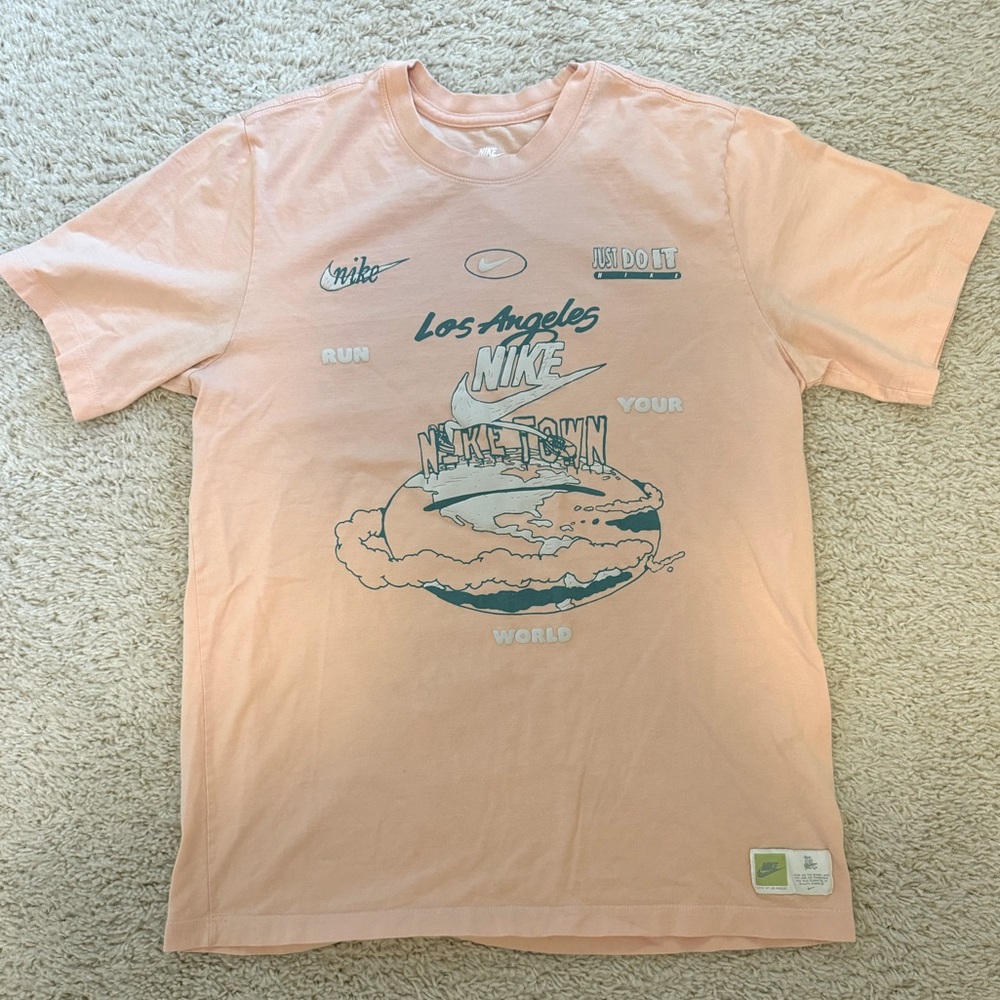 PINK NIKE GRAPHIC TEE